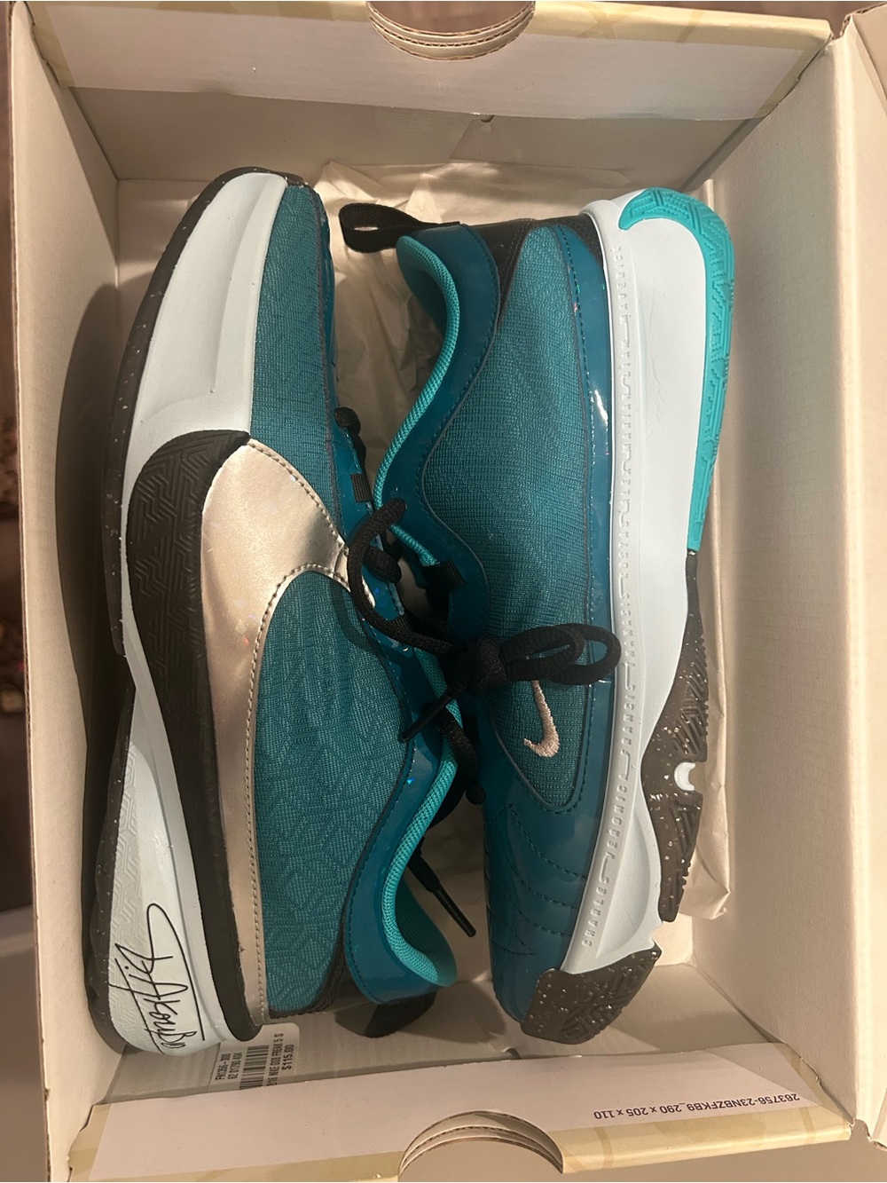 Nike Teal and Silver Kids' Sneakers with Black Accents